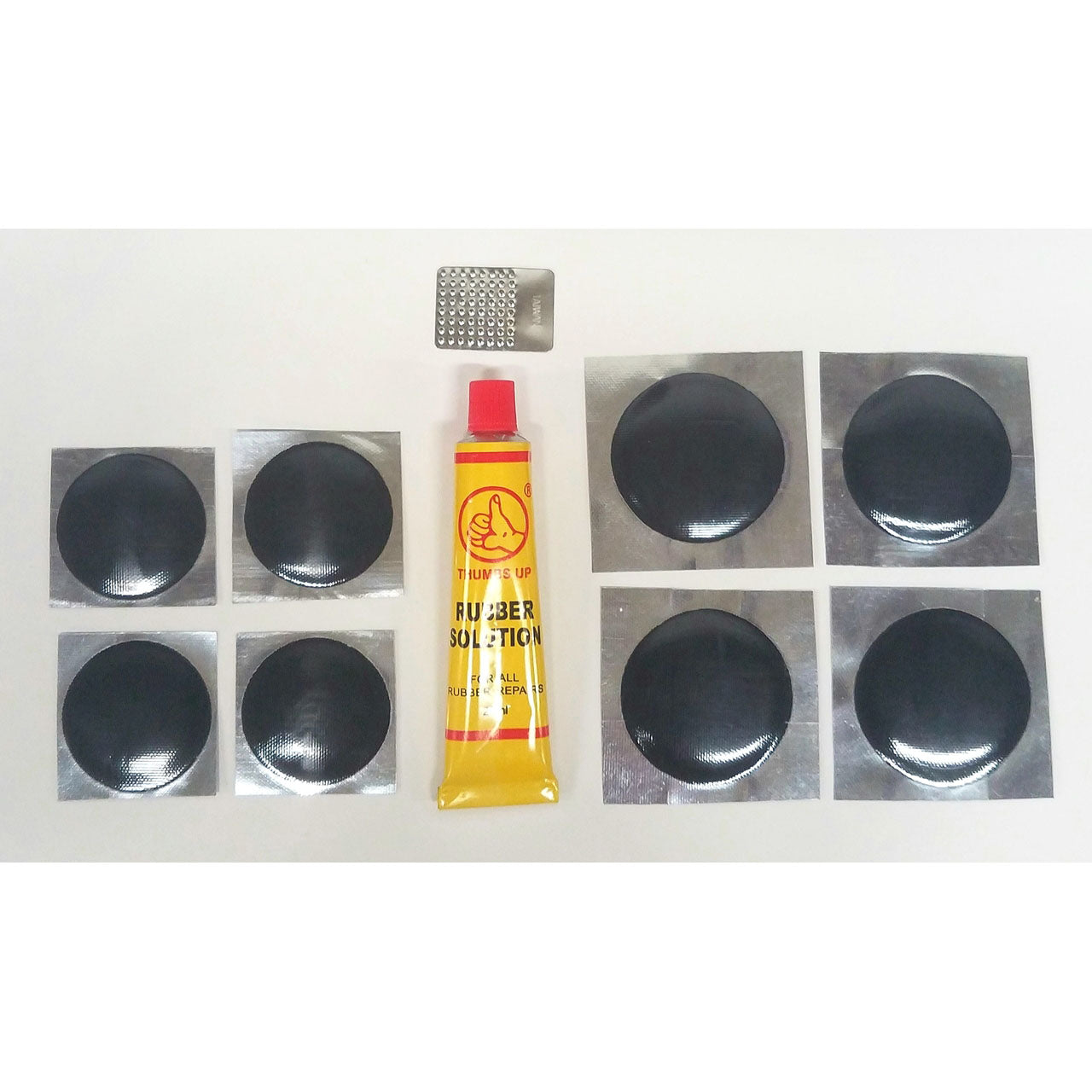 Tube-Type Tire Patches Tube of Rubber Cement - Main Image